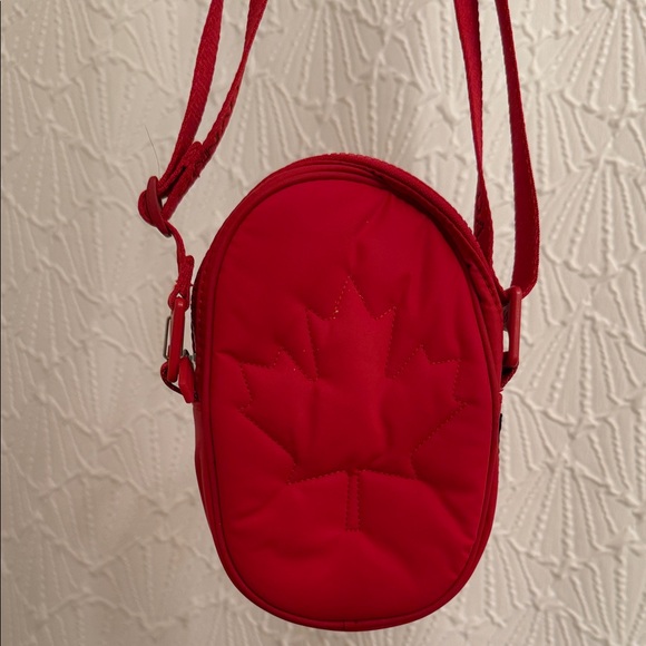 lululemon athletica Handbags - Lululemon Red Quilted Crossbody Bag with Maple Leaf Stitch